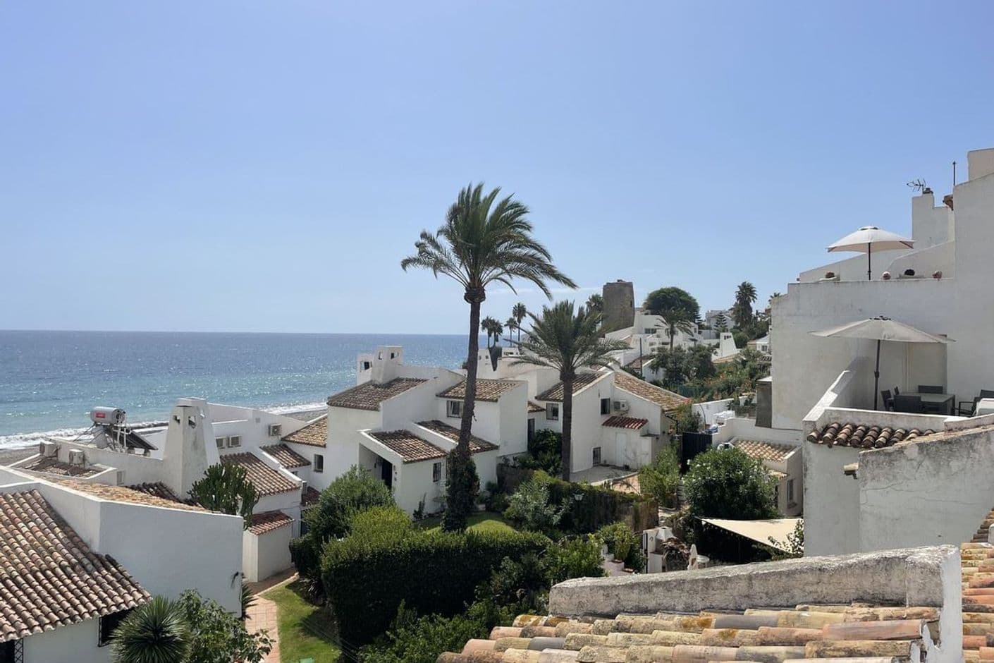 Terrace a stone's throw from the beach