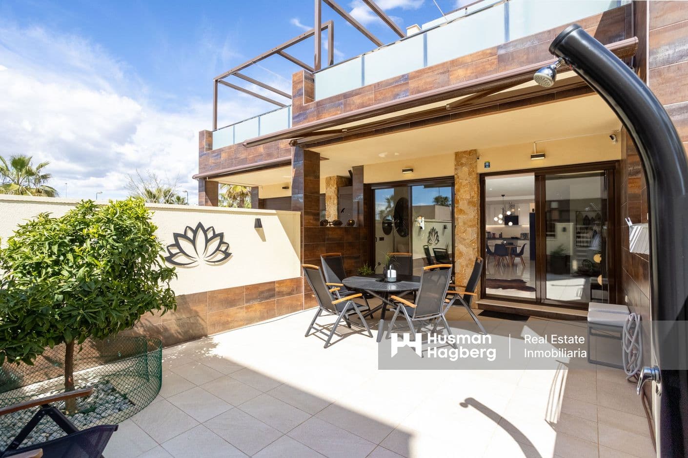 Stylish townhouse with large patios, solar panels and communal pool