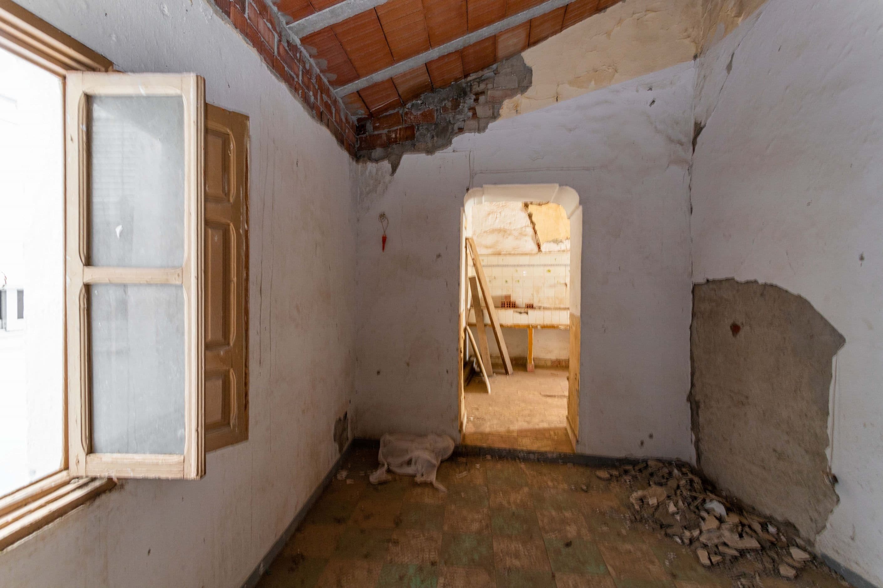 the smaller house