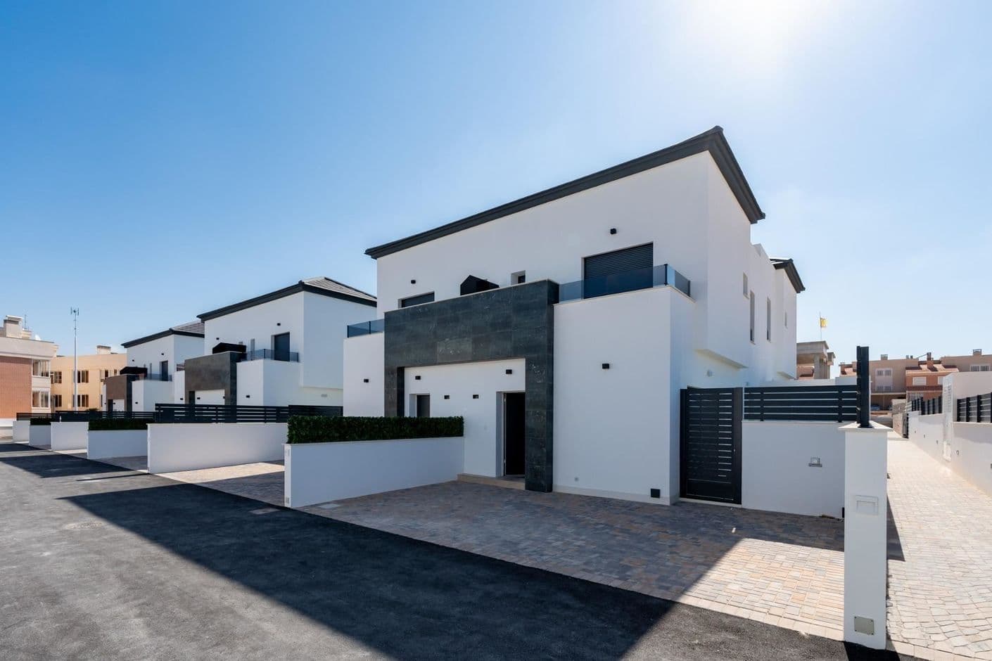 Modern bungalows with garden, terraces and communal pool Modern bungalows with garden, terraces and communal pool